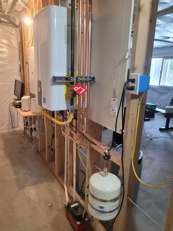 Licensed plumber repairing a kitchen sink in Buffalo
